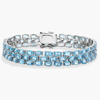 Ocean Cascade Triple Row Blue Topaz Tennis Bracelet in 925 Sterling Silver