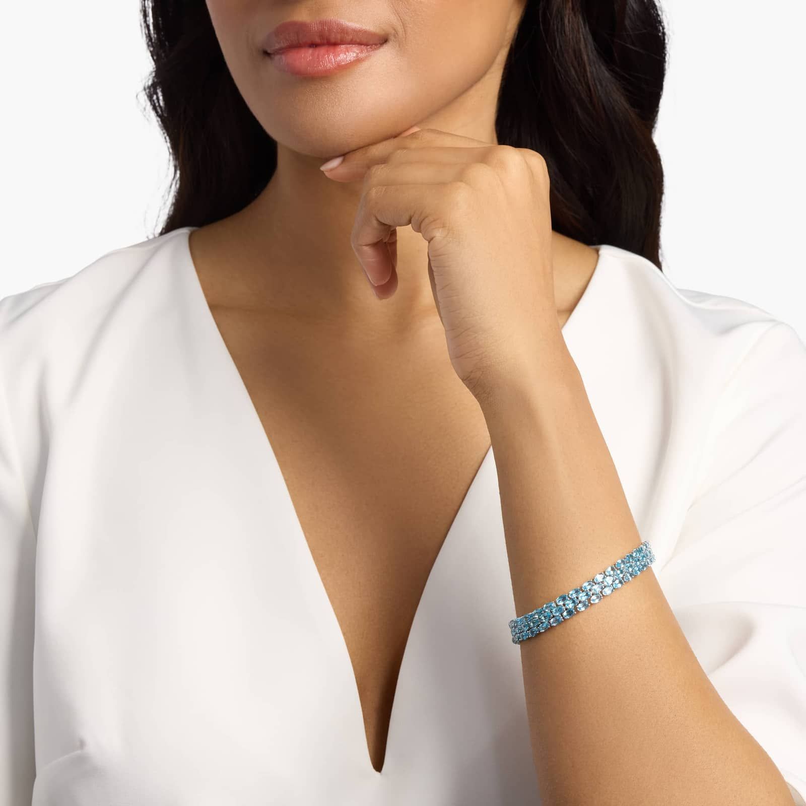 Ocean Cascade Triple Row Blue Topaz Tennis Bracelet in 925 Sterling Silver