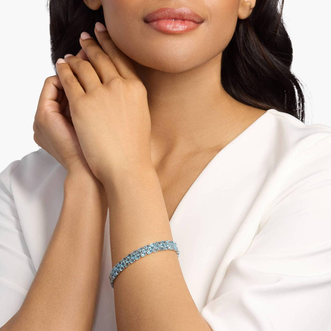 Ocean Cascade Triple Row Blue Topaz Tennis Bracelet in 925 Sterling Silver
