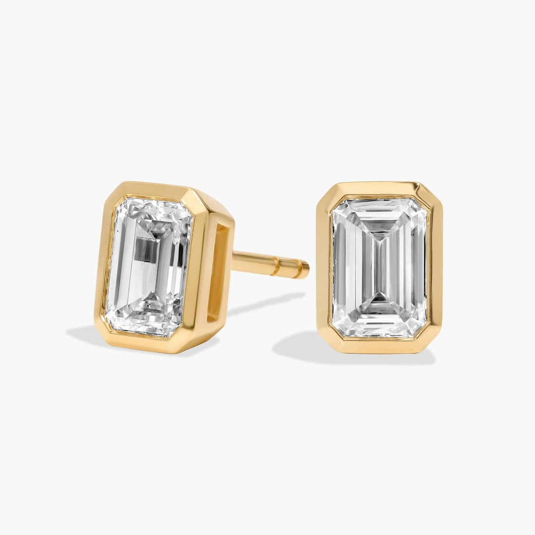 Bezel Set Emerald Cut Lab-Grown Diamond Stud Earrings In White Gold