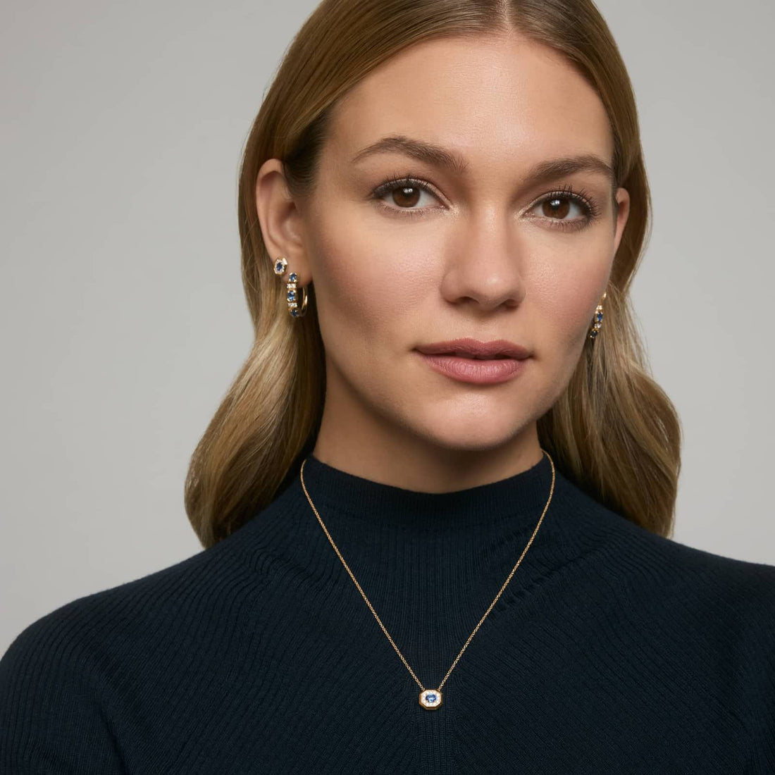 Oval Cut Blue Sapphire and Pavé Diamond Stud Earrings In Yellow Gold