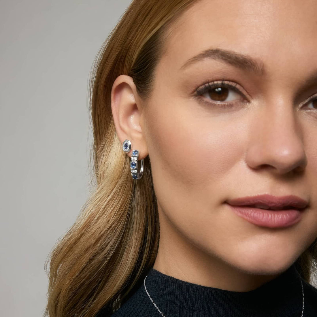 Oval Cut Blue Sapphire and Diamond Hoop Earrings In White & Yellow Gold