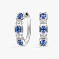 Oval Cut Blue Sapphire and Diamond Hoop Earrings In White & Yellow Gold
