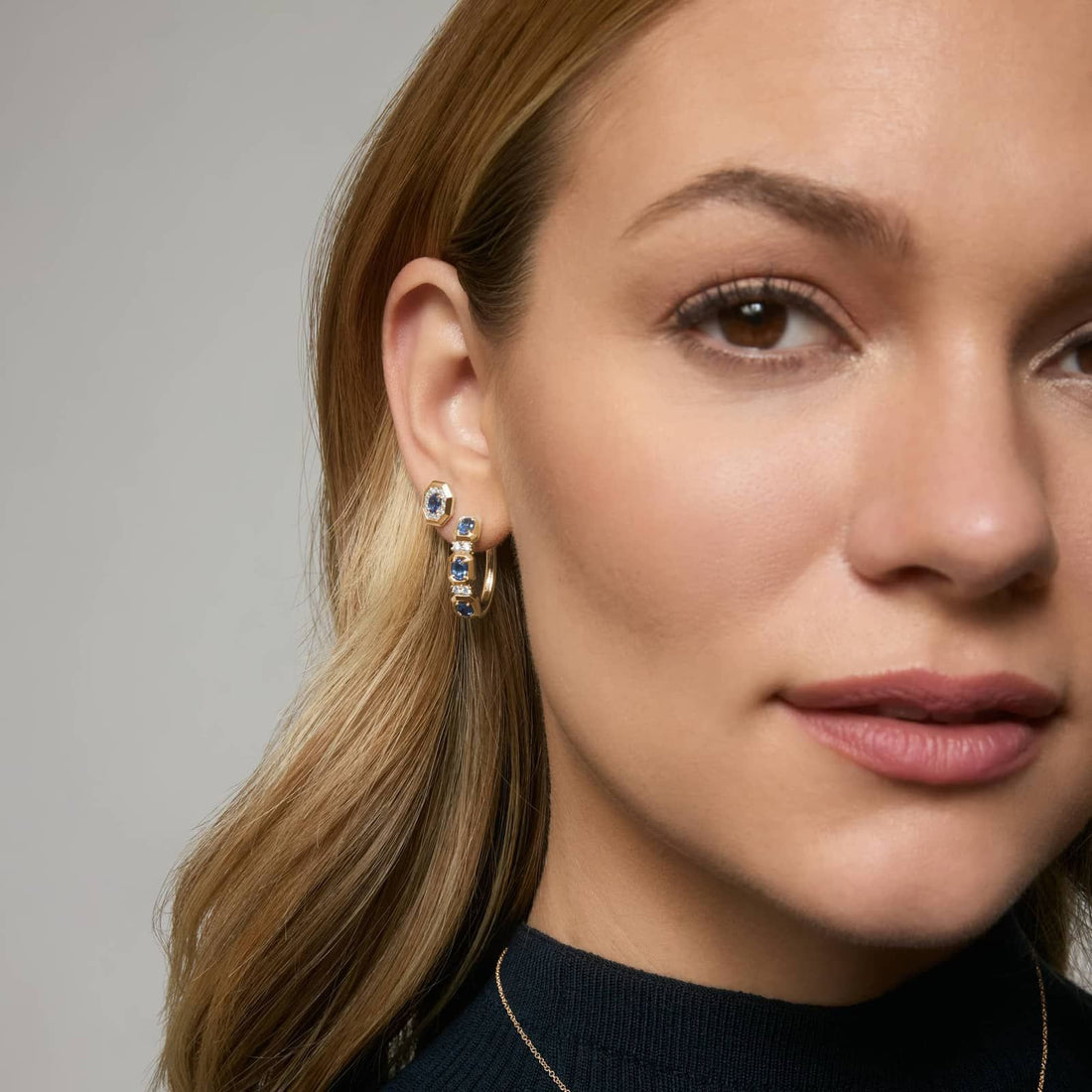 Oval Cut Blue Sapphire and Diamond Hoop Earrings In White & Yellow Gold