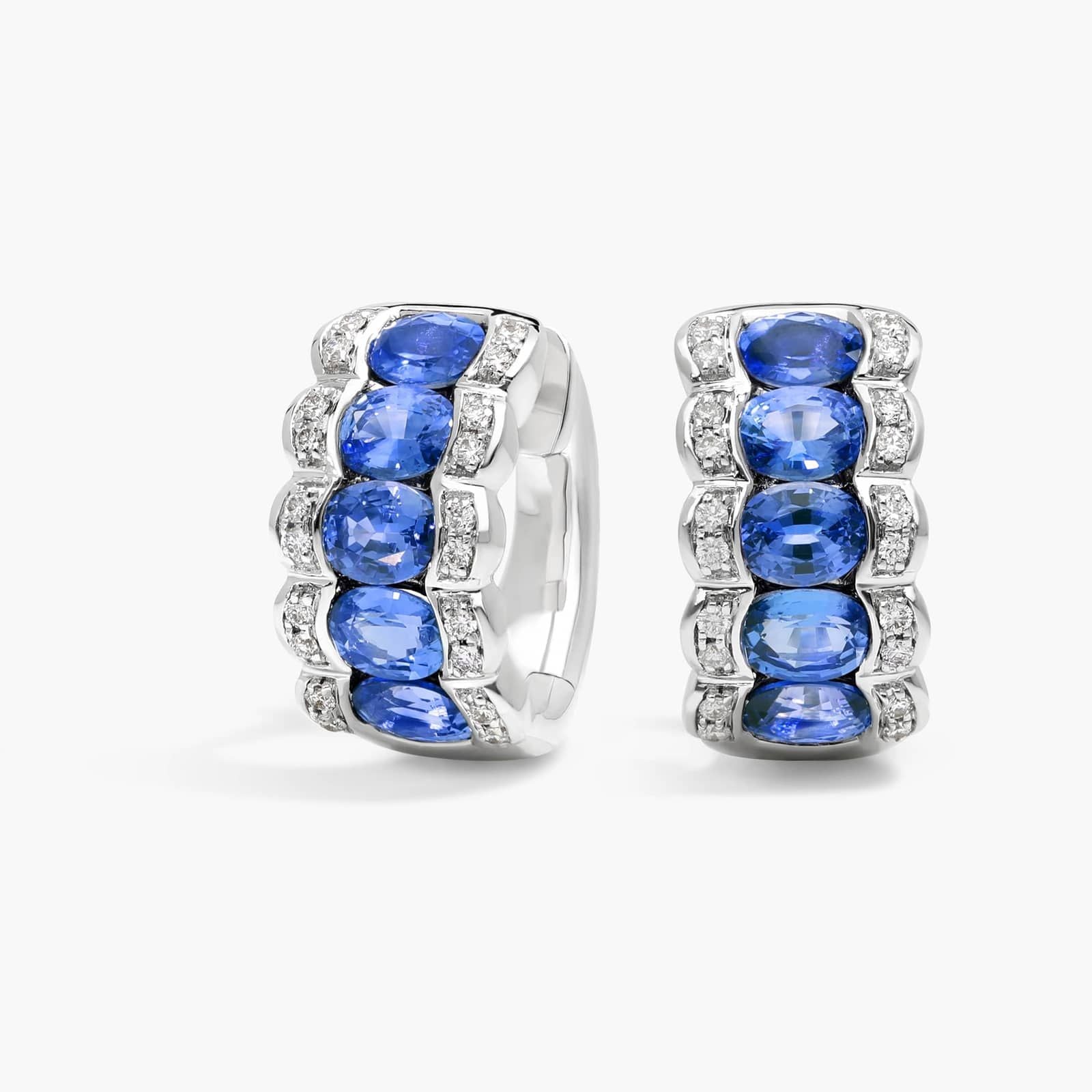 East-West Oval Cut Blue Sapphire and Pave Diamond Hoop Earrings In White Gold / Yellow Gold
