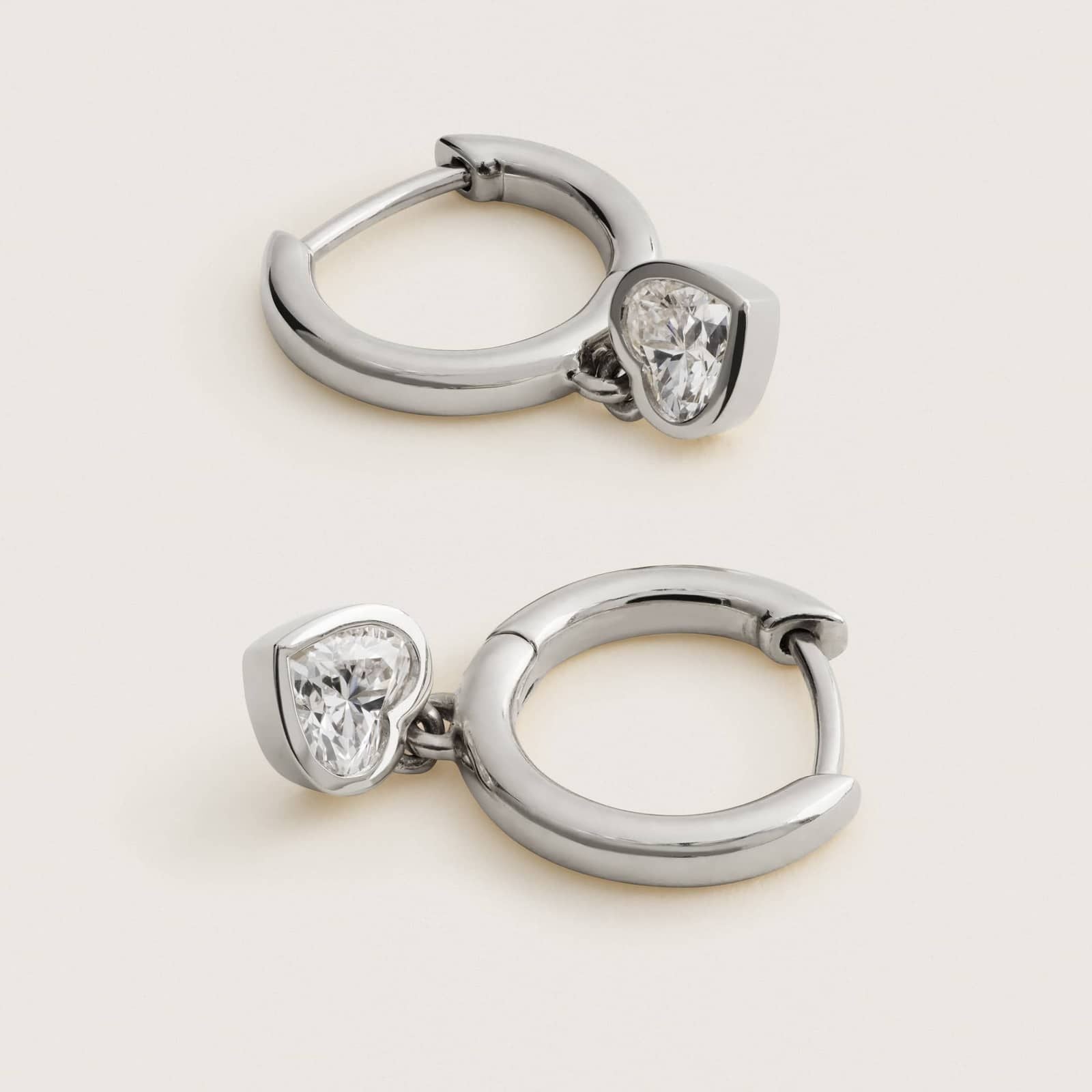 Heart Diamond Bezel Drop Huggie Earrings in White & Yellow Gold