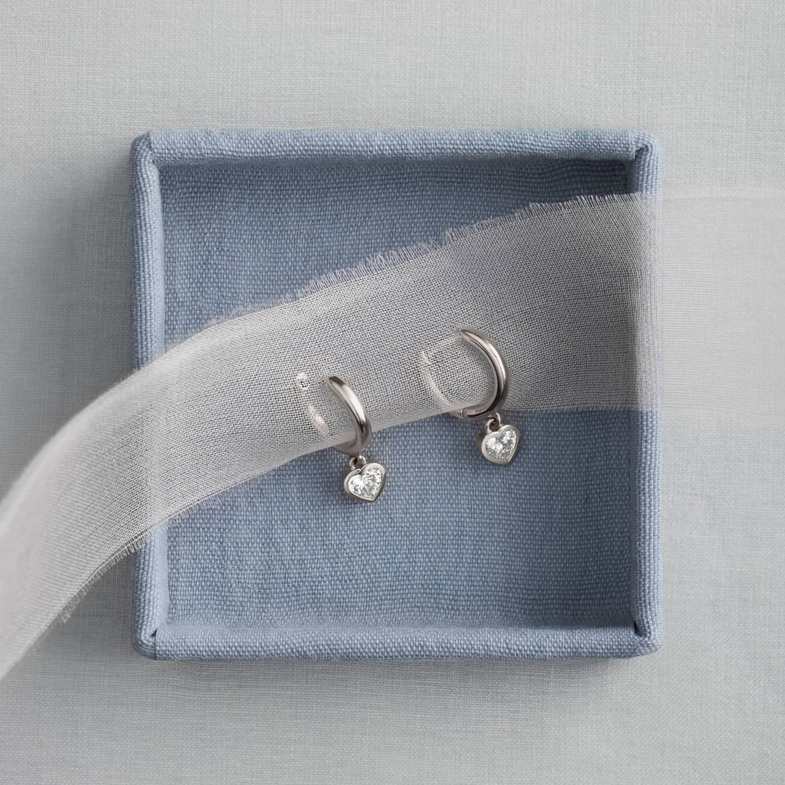 Heart Diamond Bezel Drop Huggie Earrings in White & Yellow Gold