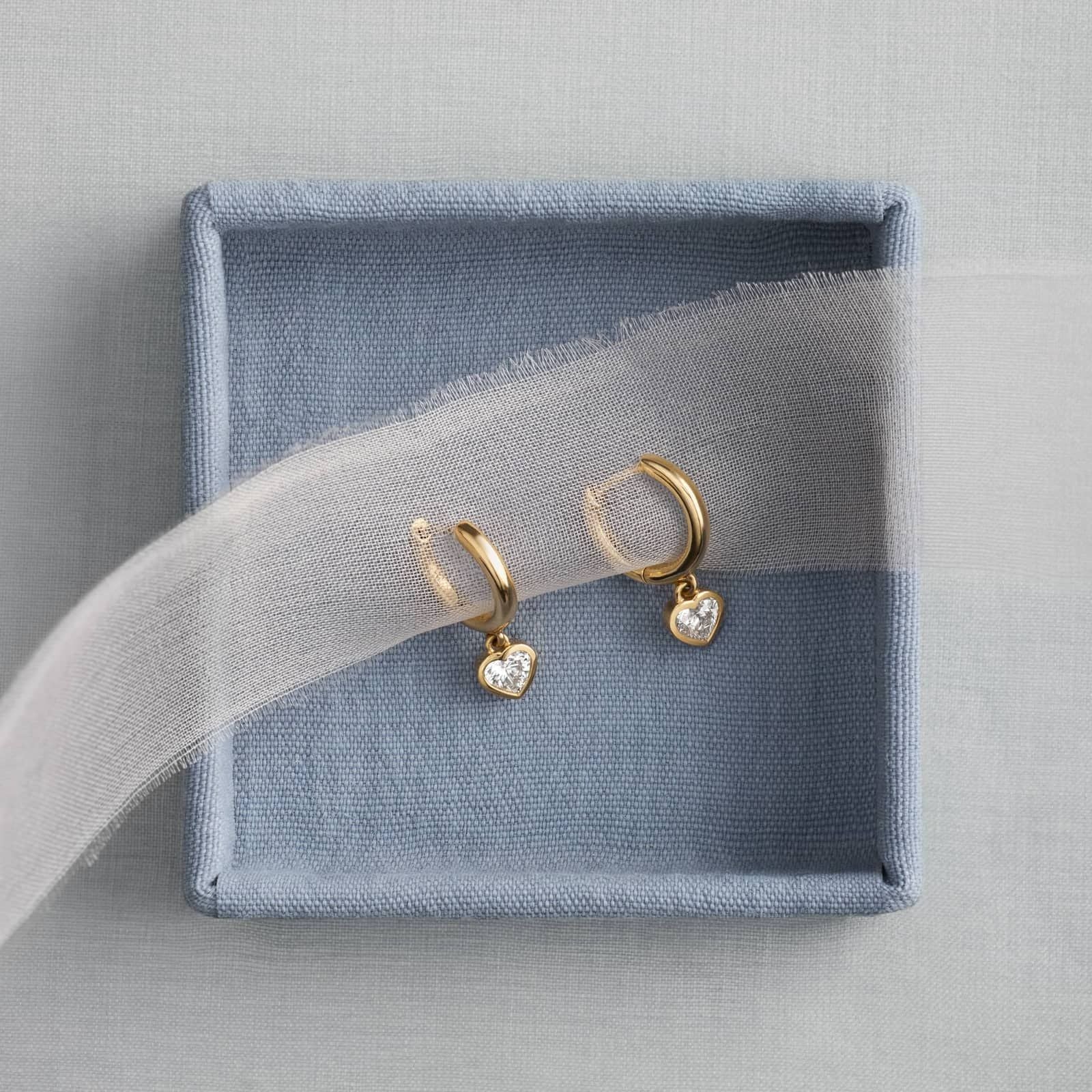 Heart Diamond Bezel Drop Huggie Earrings in White & Yellow Gold