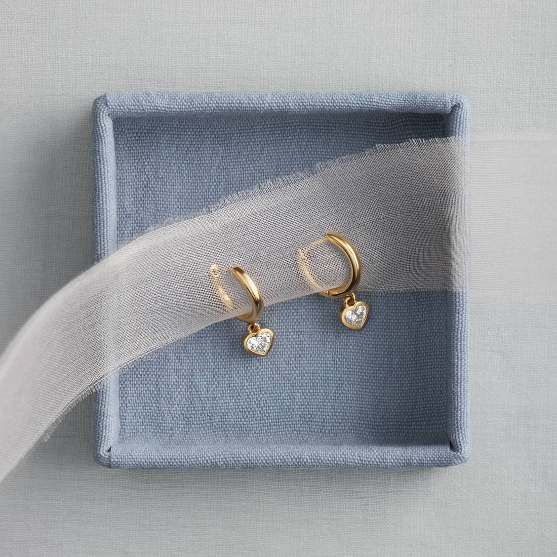 Heart Diamond Bezel Drop Huggie Earrings in White & Yellow Gold