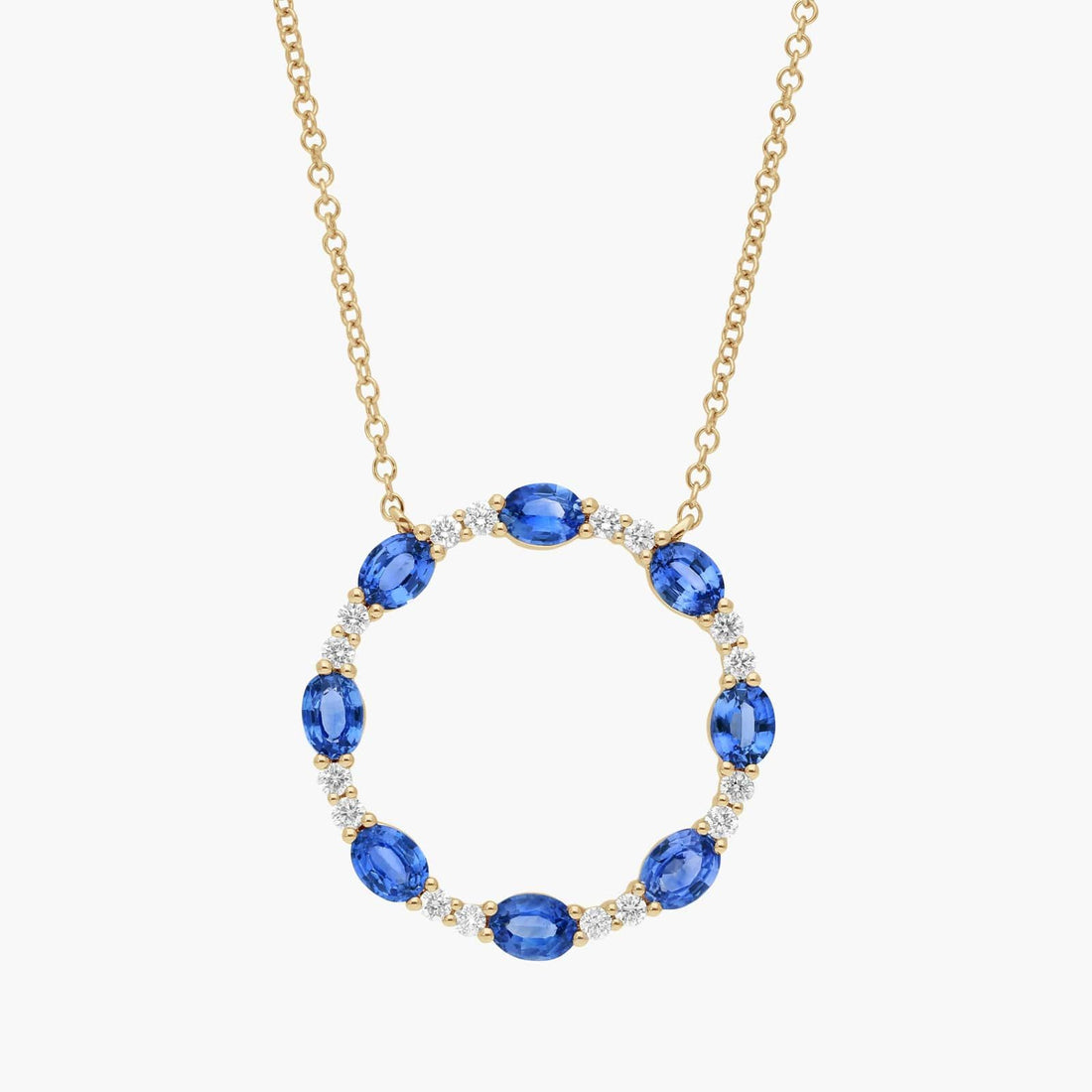 Oval Cut Blue Sapphire and Diamond Circle Pendant Necklace In White Gold / Yellow Gold