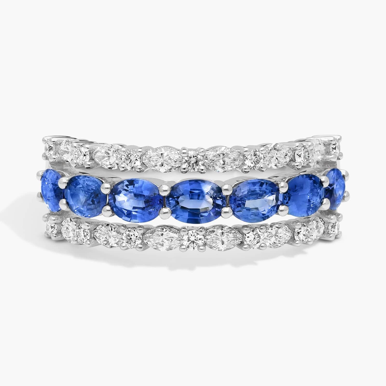 East-West Oval Cut Blue Sapphire and Diamond Ring In White Gold / Yellow Gold