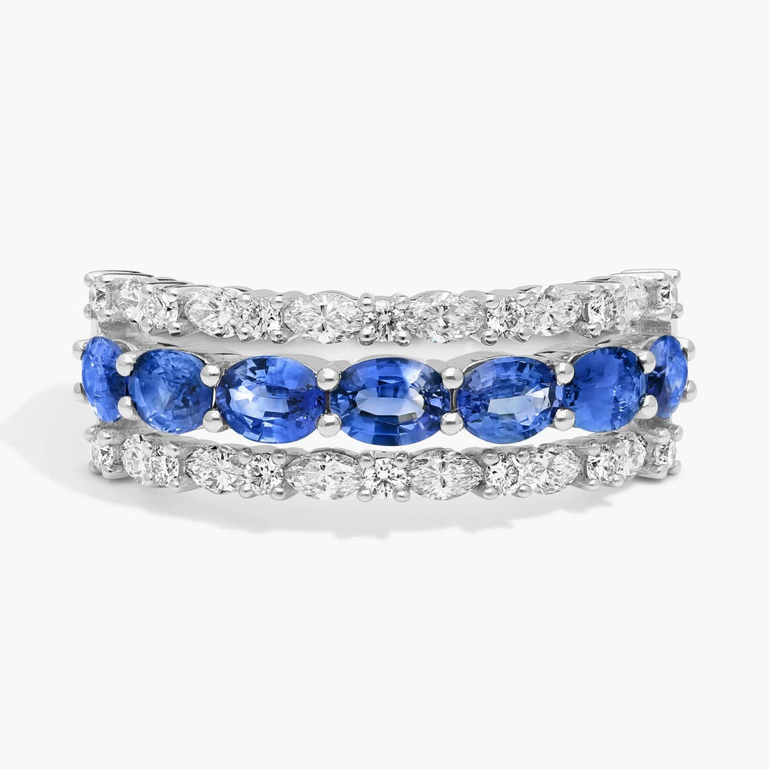 East-West Oval Cut Blue Sapphire and Diamond Ring In White Gold / Yellow Gold
