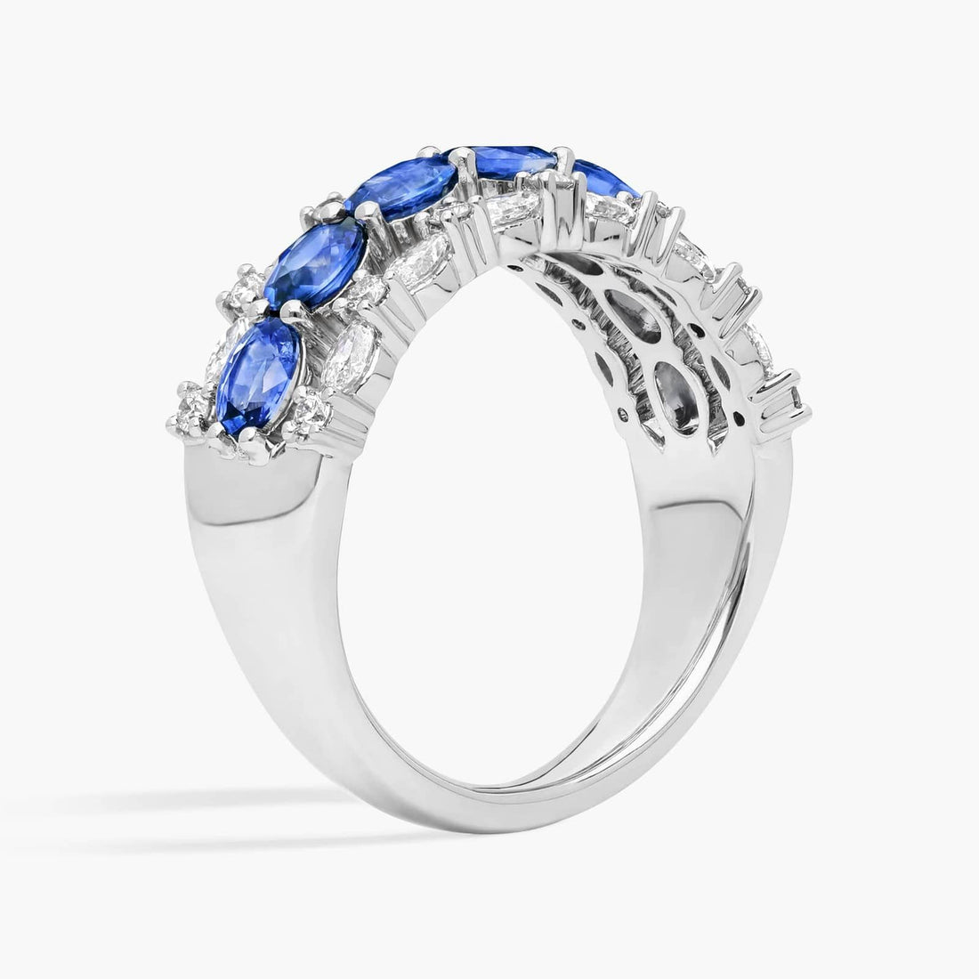 East-West Oval Cut Blue Sapphire and Diamond Ring In White Gold / Yellow Gold