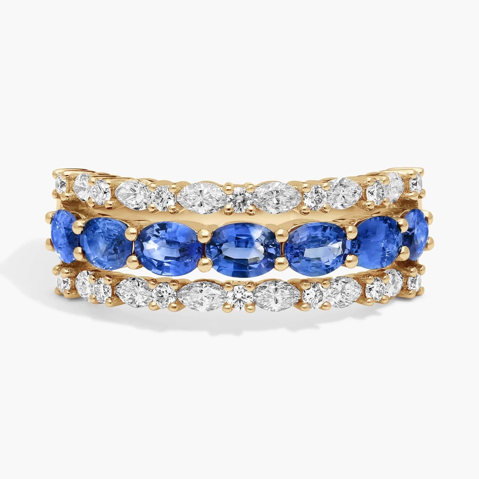 East-West Oval Cut Blue Sapphire and Diamond Ring In White Gold / Yellow Gold