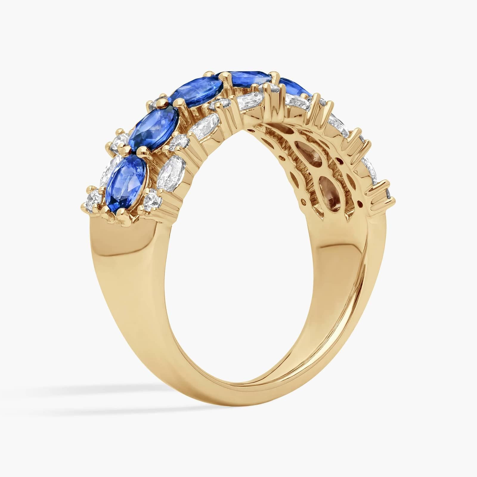 East-West Oval Cut Blue Sapphire and Diamond Ring In White Gold / Yellow Gold