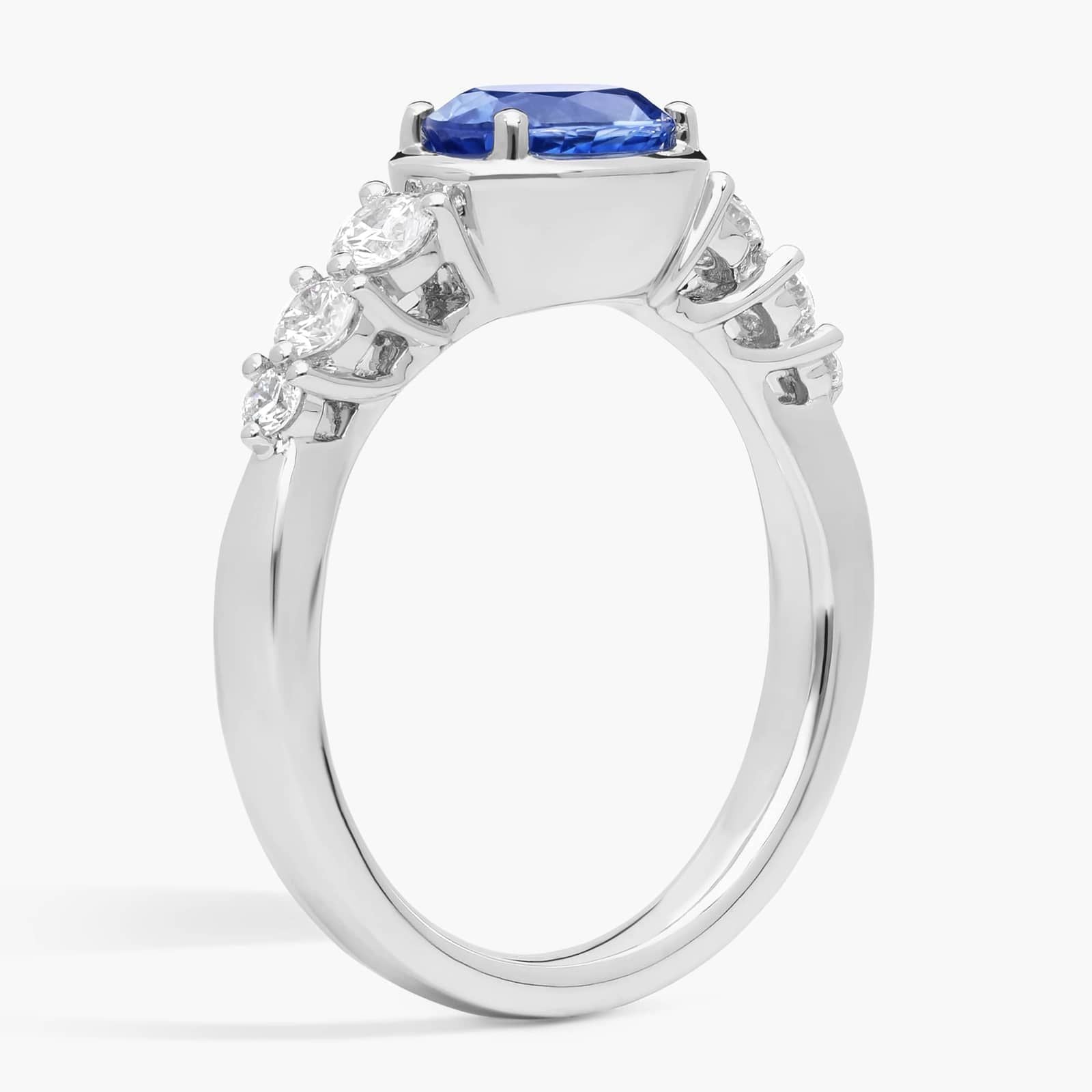 East-West Oval Cut Sapphire Ring With Half Bezel and Diamond Accent In White Gold / Yellow Gold